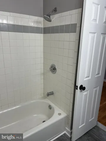 a bathroom with a bathtub