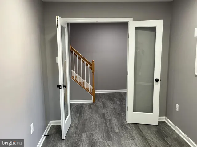 a view of entryway with wooden floor