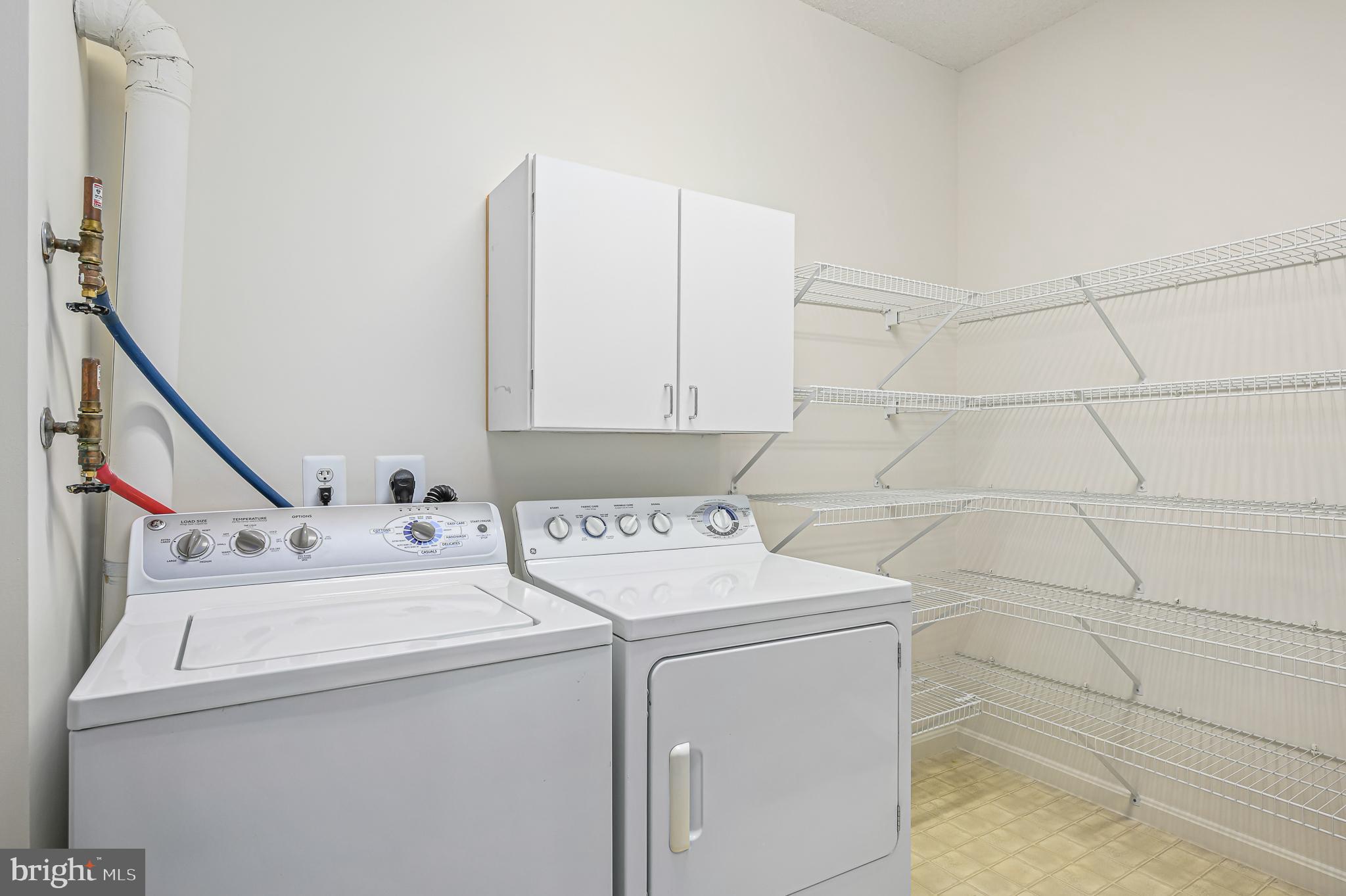 19355 Cypress Ridge Terrace, Unit 802 Leesburg, VA 20176 - Photo 22 of 45 Laundry Room with plenty of storage