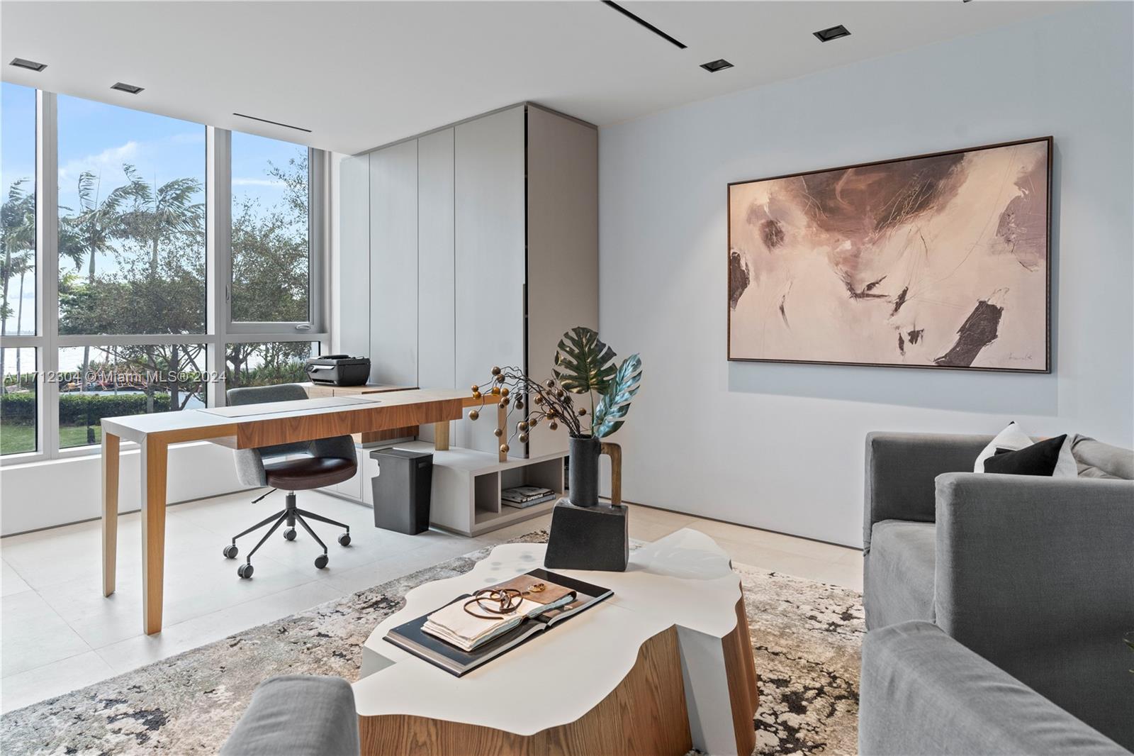 650 Northeast 32nd Street, Unit BH2 Miami, FL 33137 - Photo 24 of 30 a workspace with furniture and window