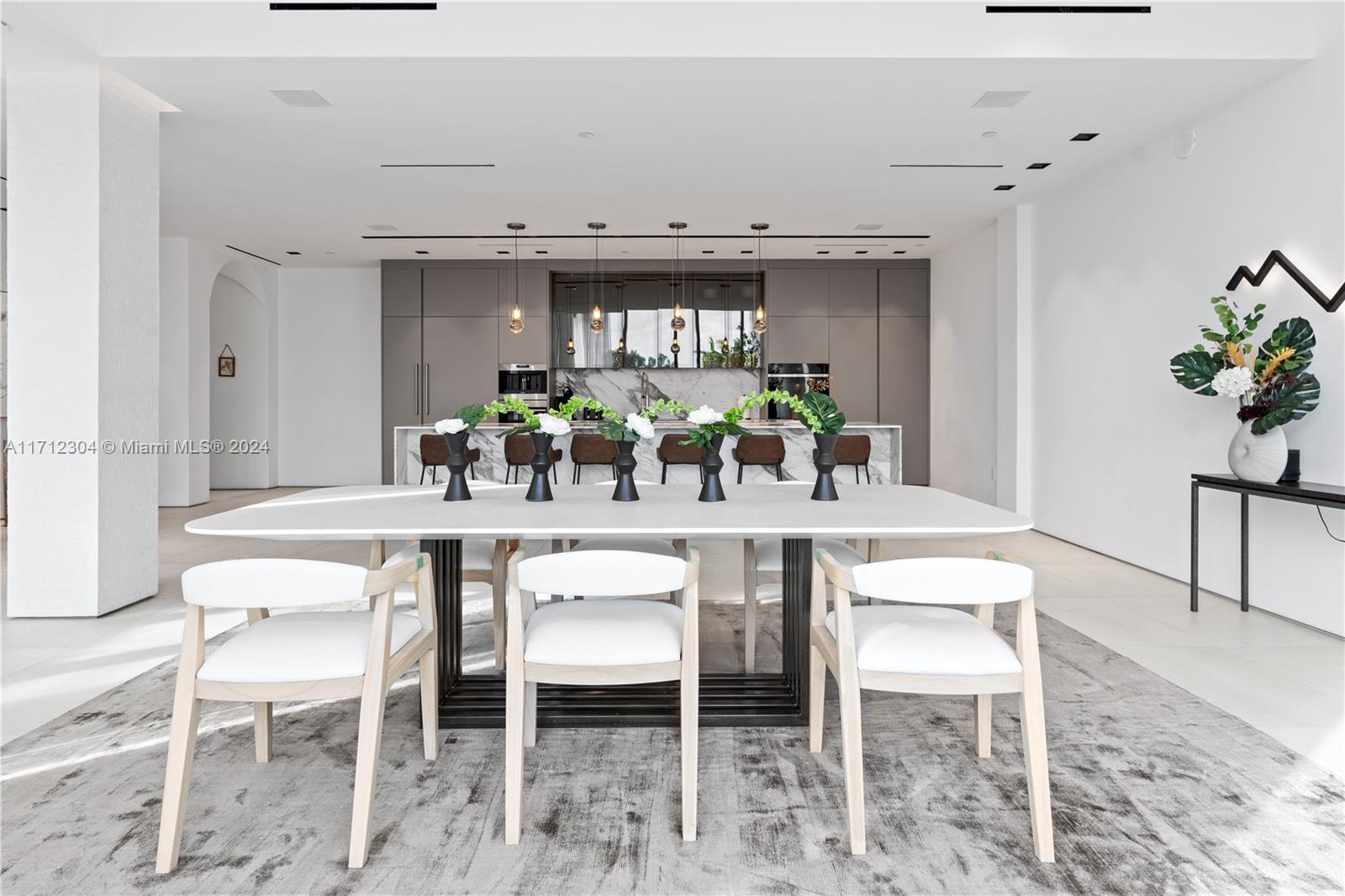 650 Northeast 32nd Street, Unit BH2 Miami, FL 33137 - Photo 5 of 30 a dining room with furniture and window