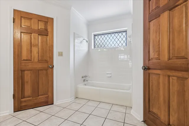 a view of a hallway with washer and dryer