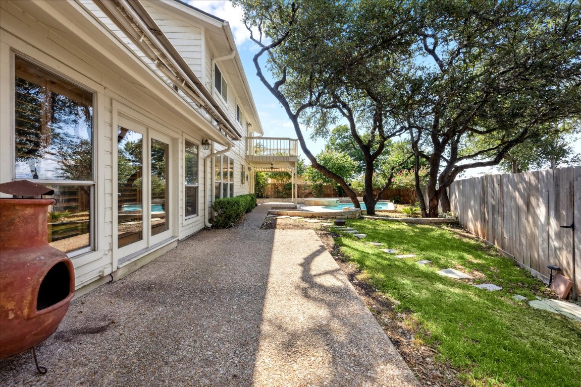 6104 Nashua Court Austin, TX 78746 - Photo 31 of 31 a view of a garden with pathway