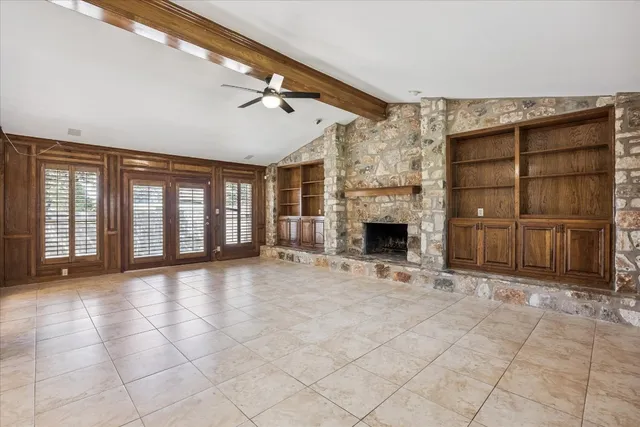 a living room with a fireplace