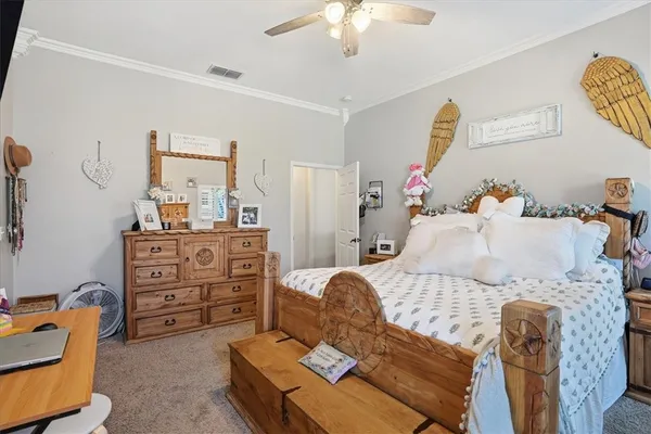 a bedroom with a bed and furniture