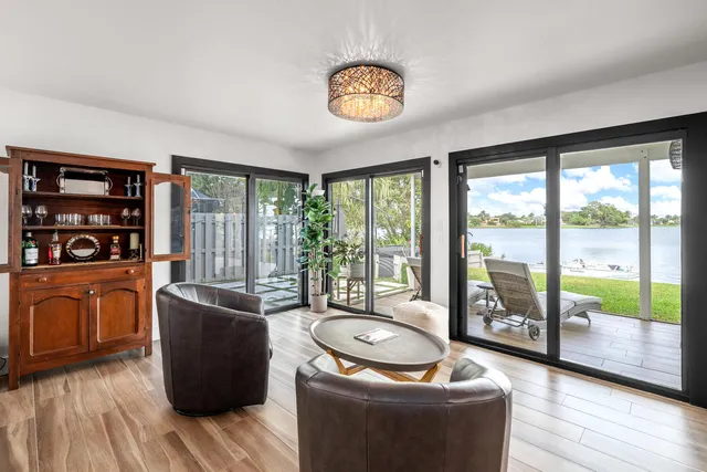 a view of a garden with lawn chairs