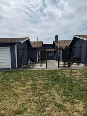 a front view of a house having yard