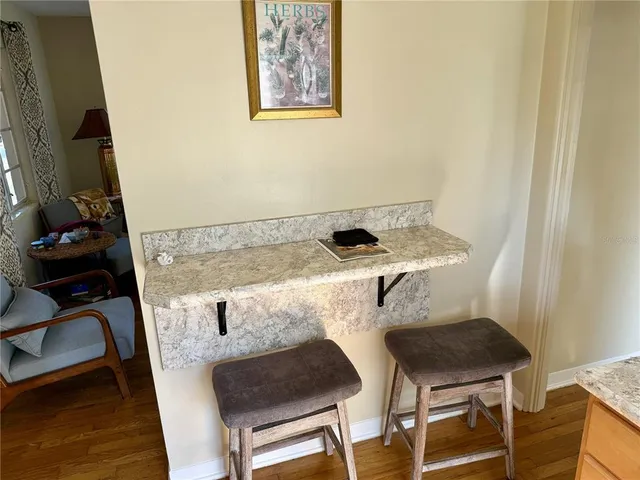 a room with a table and chairs