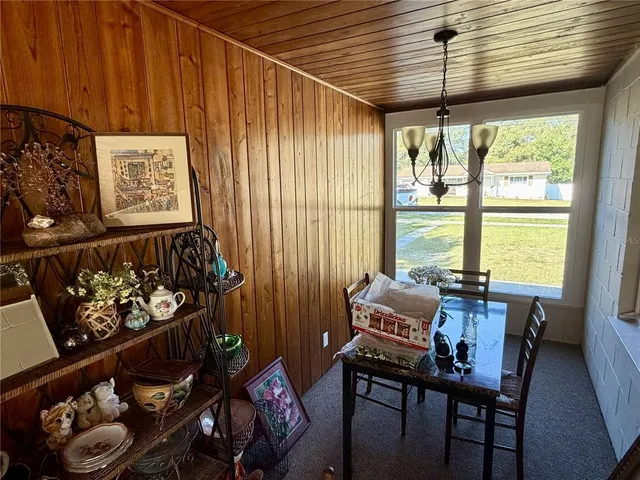 a room with furniture and a large window