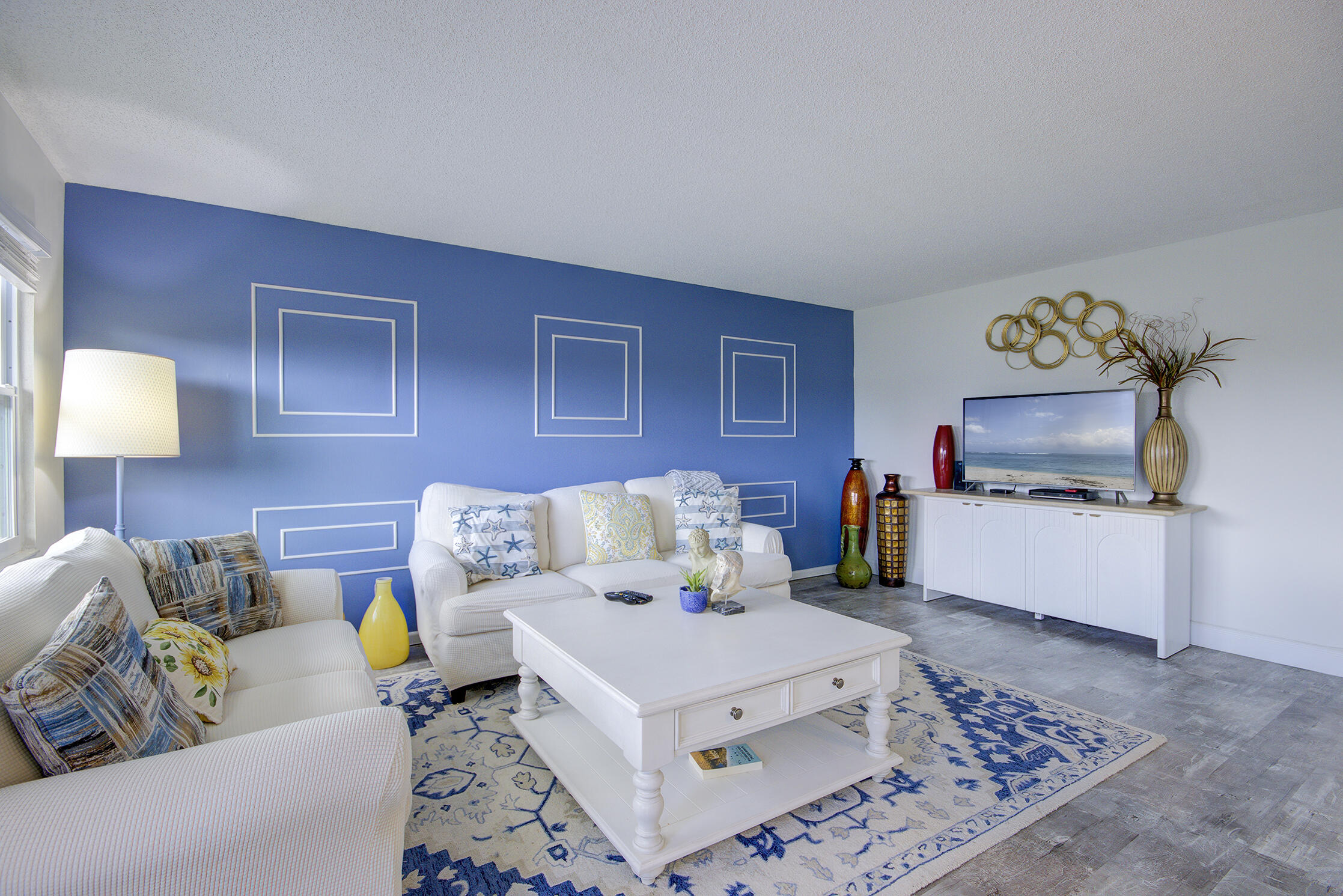 a living room with furniture and a couch