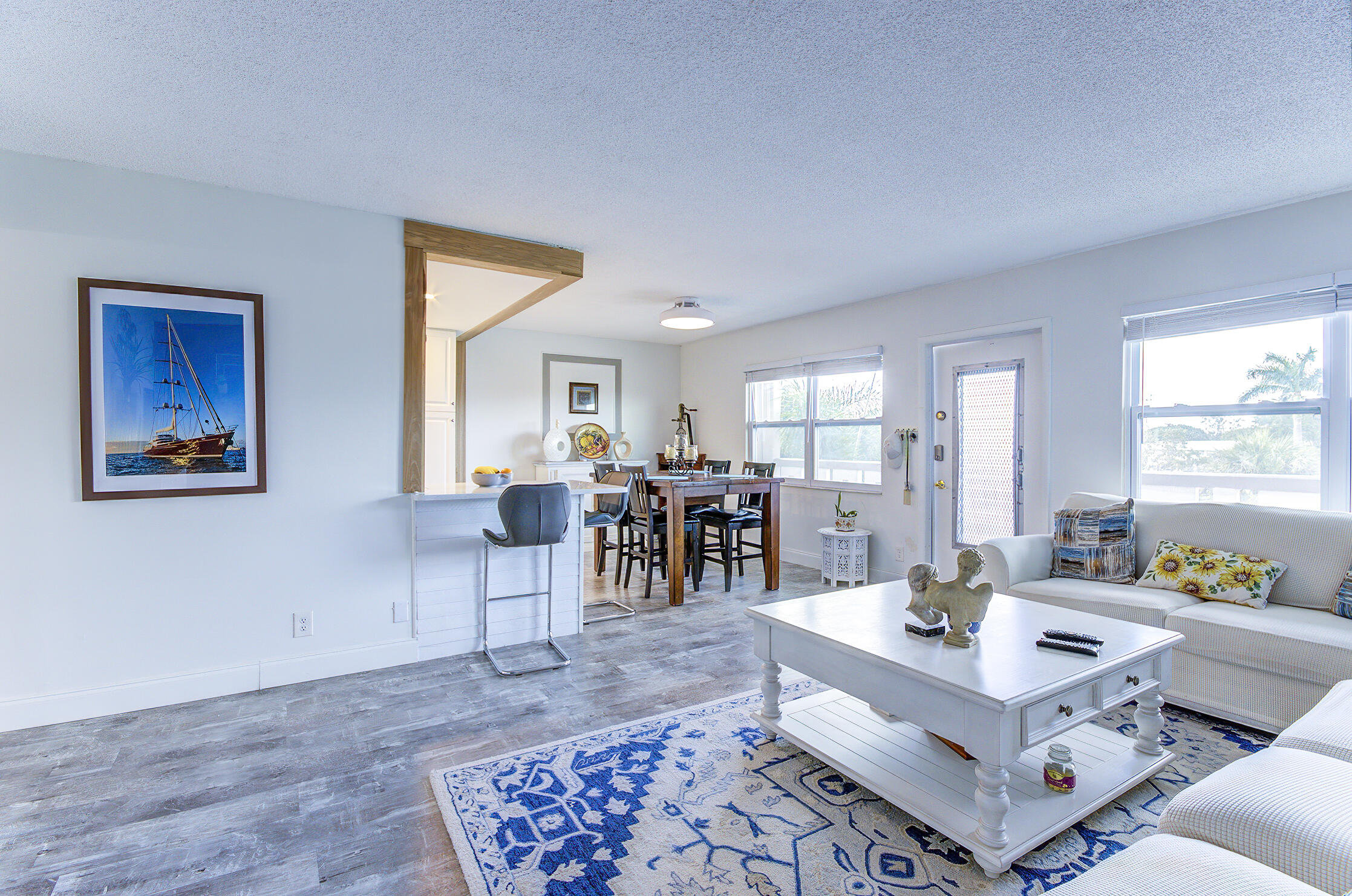 363 Wellington J West Palm Beach, FL 33417 - Photo 3 of 17 a living room with furniture and wooden floor