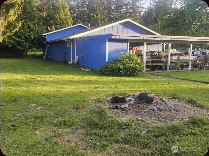 1245 West Axton Road Ferndale, WA 98248 - Photo 3 of 30 a front view of a house with garden