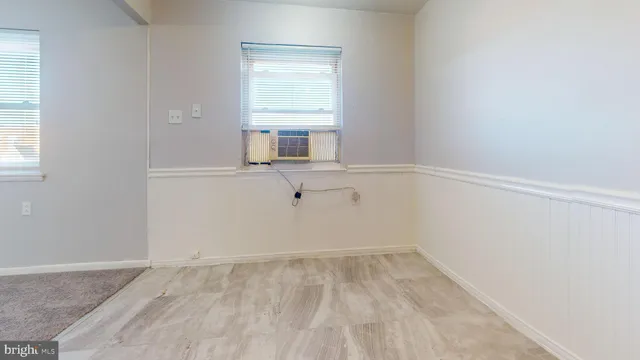 a view of a room that has a window in it