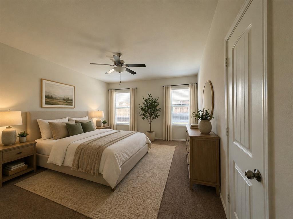 4700 Essonite Road Little Elm, TX 76227 - Photo 17 of 37 a bedroom with a large bed couch and windows