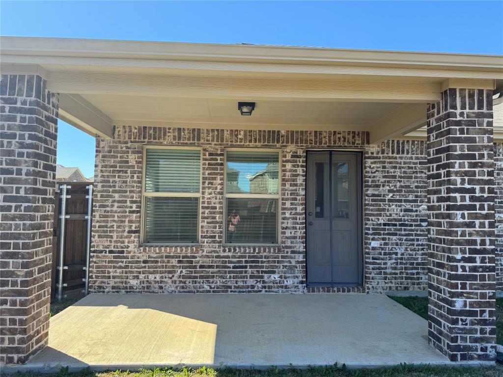 4700 Essonite Road Little Elm, TX 76227 - Photo 32 of 37 a front view of a house with a garage