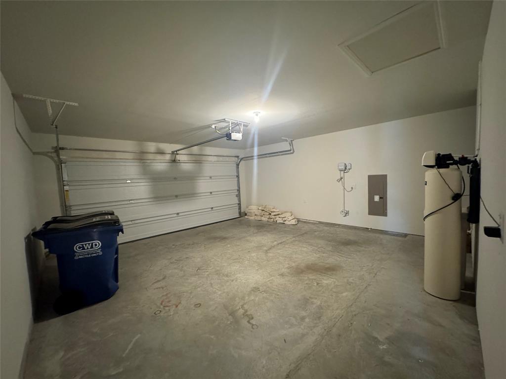 4700 Essonite Road Little Elm, TX 76227 - Photo 33 of 34 Garage with water softner