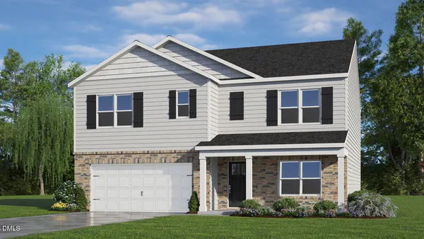 a view of a house with yard