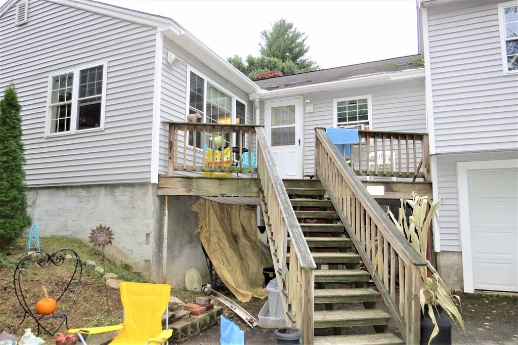 114 North Main Street Salem, NH 03079 - Photo 2 of 26 a view of entryway and hall with wooden floor