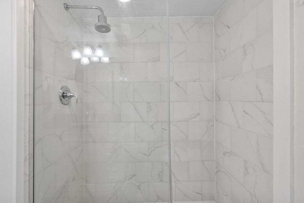 6 Edith Road Hudson, MA 01749 - Photo 20 of 30 a bathroom with a shower