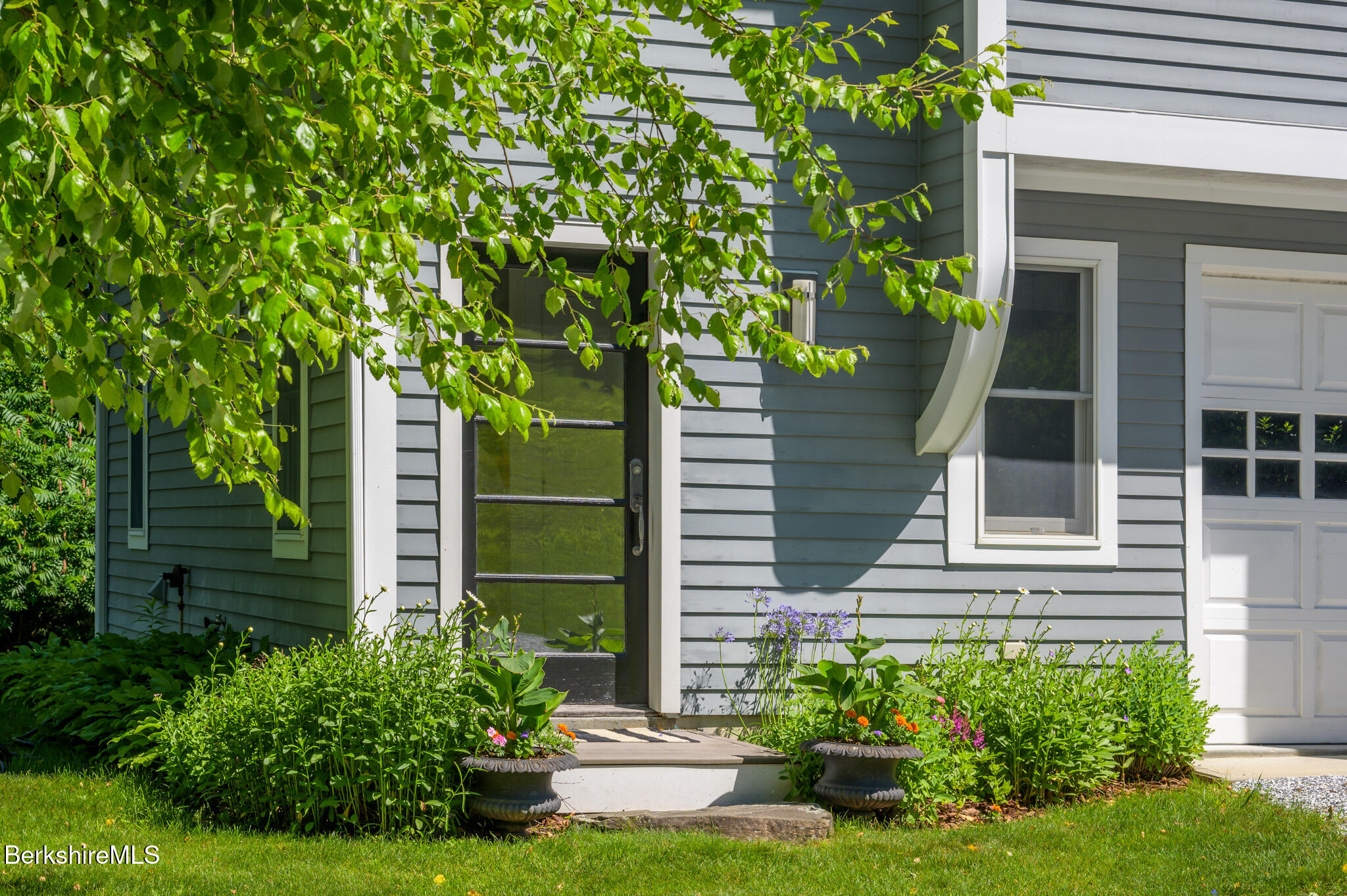 176 West Center Road West Stockbridge, MA 01266 - Photo 42 of 57 a house with a tree in front of it