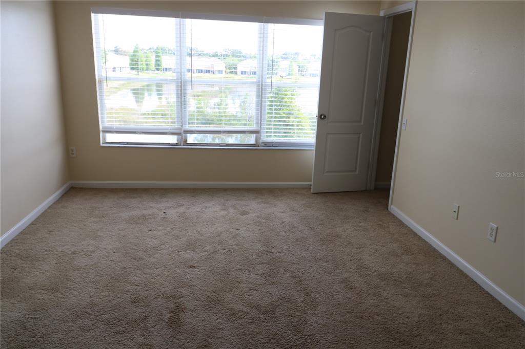 10165 Haverhill Ridge Drive Riverview, FL 33578 - Photo 21 of 33 an empty room with a window
