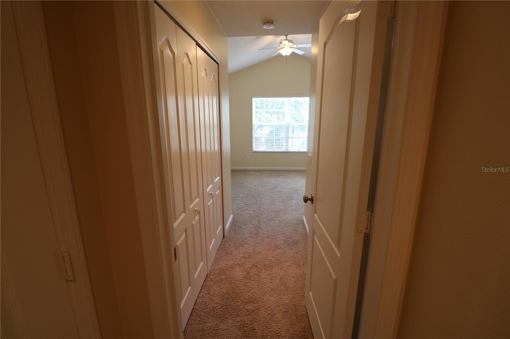10165 Haverhill Ridge Drive Riverview, FL 33578 - Photo 31 of 33 a view of a hallway with windows