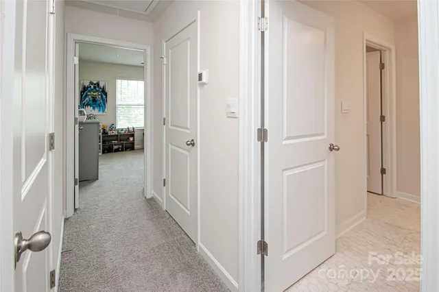 a view of a livingroom from a hallway