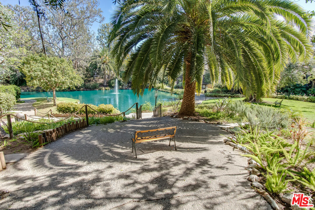 4107 Raintree Circle Culver City, CA 90230 - Photo 18 of 23 a park view with a bench and trees