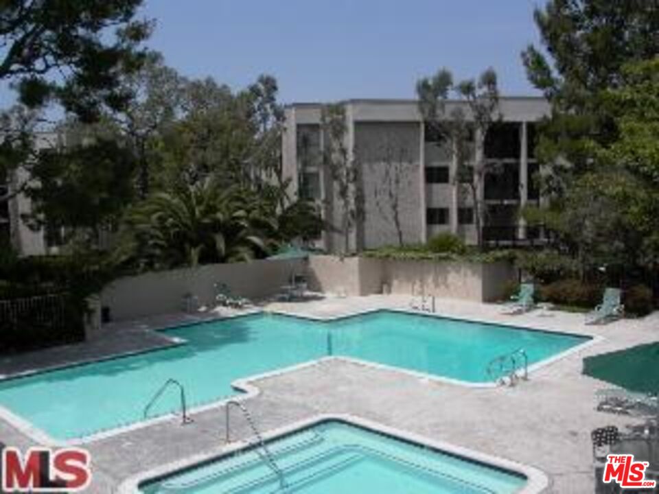 4107 Raintree Circle Culver City, CA 90230 - Photo 23 of 23 a view of a house with a yard and a garden
