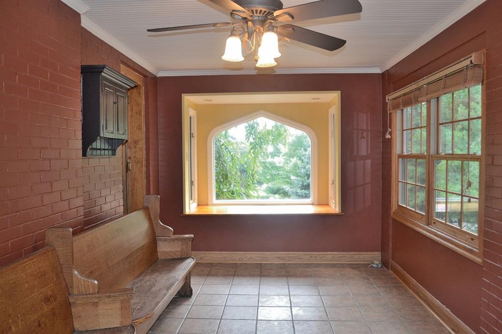138 Siebert Road Pittsburgh, PA 15237 - Photo 13 of 25 Family room: The ceiling in this room is a bead board ceiling, and the bay window, creating the picturesque view is certainly a highlight of the room. There are wooden blinds to cover the newer windows.
