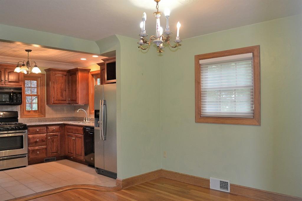 138 Siebert Road Pittsburgh, PA 15237 - Photo 7 of 25 The dining room is open to the kitchen for ease in entertaining.