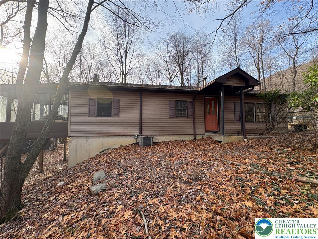 1433 Deer Path Drive Walnutport, PA 18088 - Photo 18 of 39 a backyard of a house with lots of green space