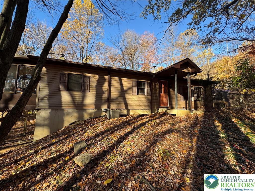 1433 Deer Path Drive Walnutport, PA 18088 - Photo 2 of 39 a view of a house with a snow on the wall