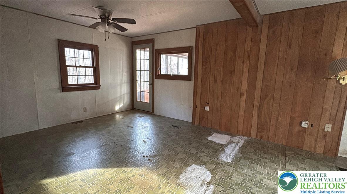 1433 Deer Path Drive Walnutport, PA 18088 - Photo 29 of 39 a view of livingroom with furniture wooden floor and window