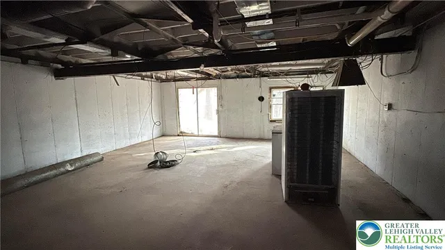 a view of storage and utility room with racks