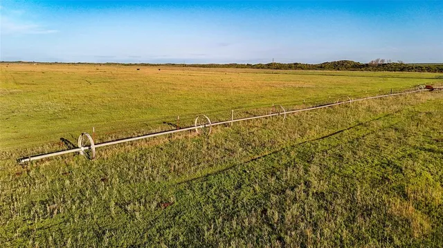 a view of a ocean with a mountain