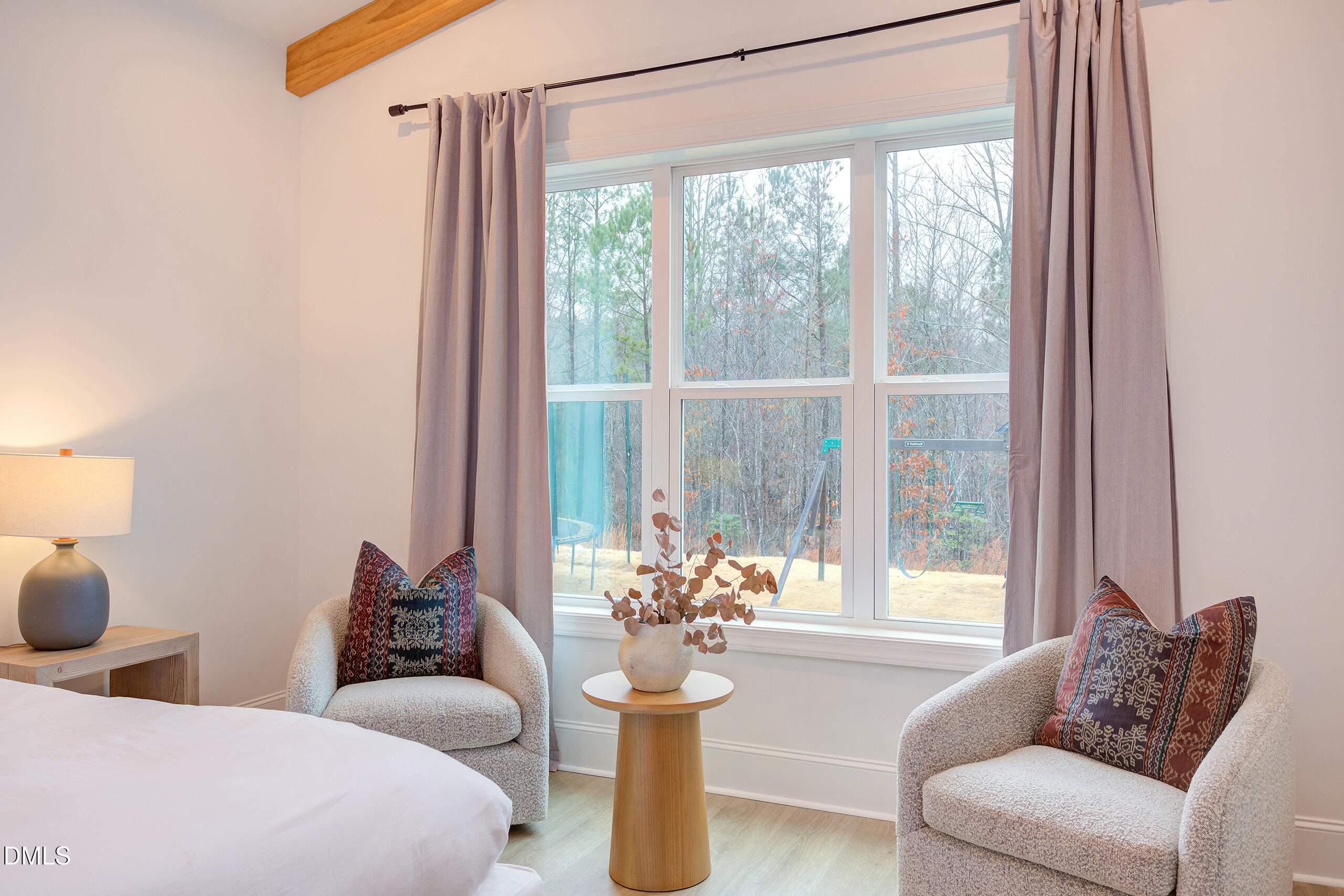 203 Post Oak Road Chapel Hill, NC 27516 - Photo 10 of 52 a living room with furniture and a large window