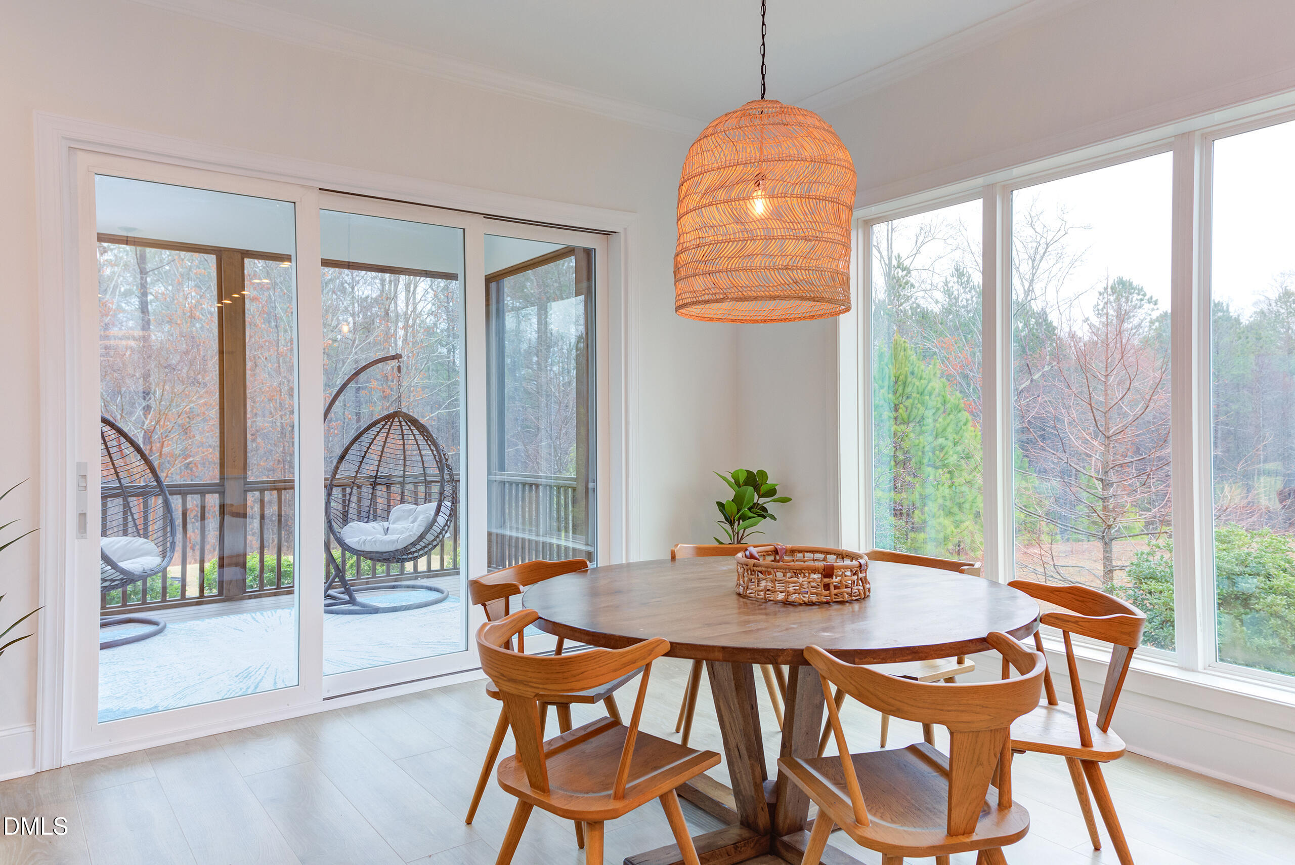 203 Post Oak Road Chapel Hill, NC 27516 - Photo 5 of 52 a view of a dining room with furniture window and outside view