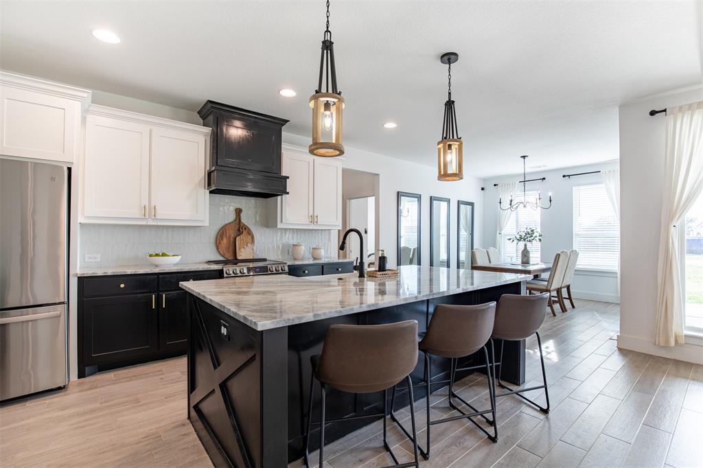 111 Bluegrass Trail Springtown, TX 76082 - Photo 18 of 37 Gourmet kitchen ideal for hosting and entertaining.