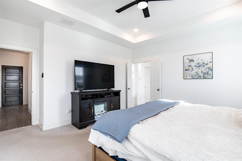 111 Bluegrass Trail Springtown, TX 76082 - Photo 21 of 37 Primary suite with double door entry to en-suite bath.