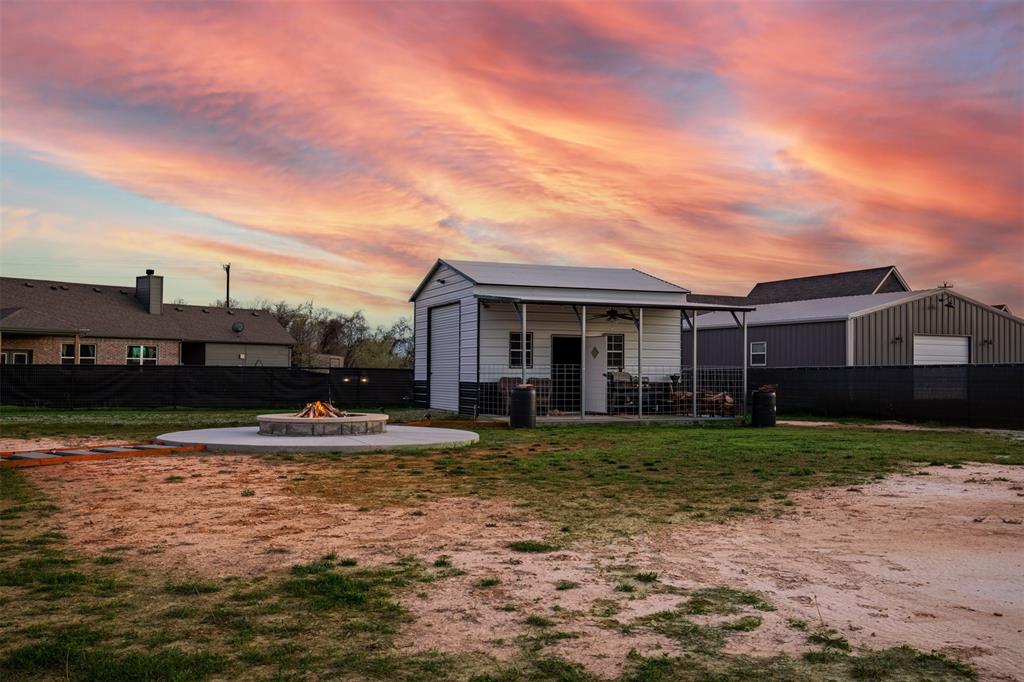111 Bluegrass Trail Springtown, TX 76082 - Photo 34 of 37 Backyard boasts 20x20 shop with 10x20 extension.