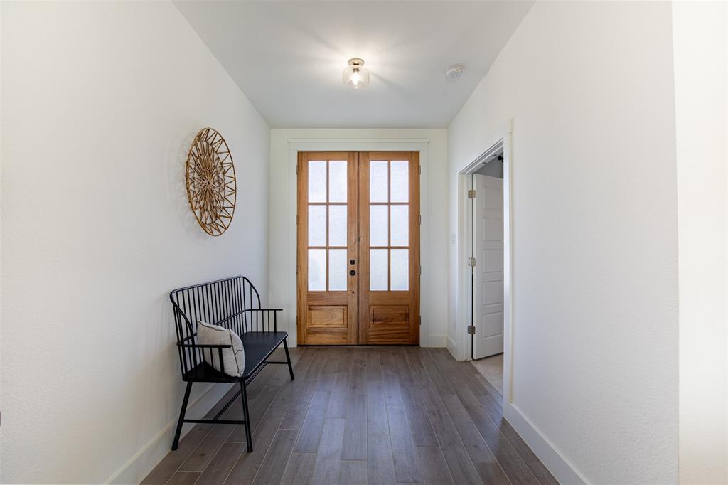 111 Bluegrass Trail Springtown, TX 76082 - Photo 7 of 37 Entry features double glass door entry with privacy glass and double door entry to dedicated office.
