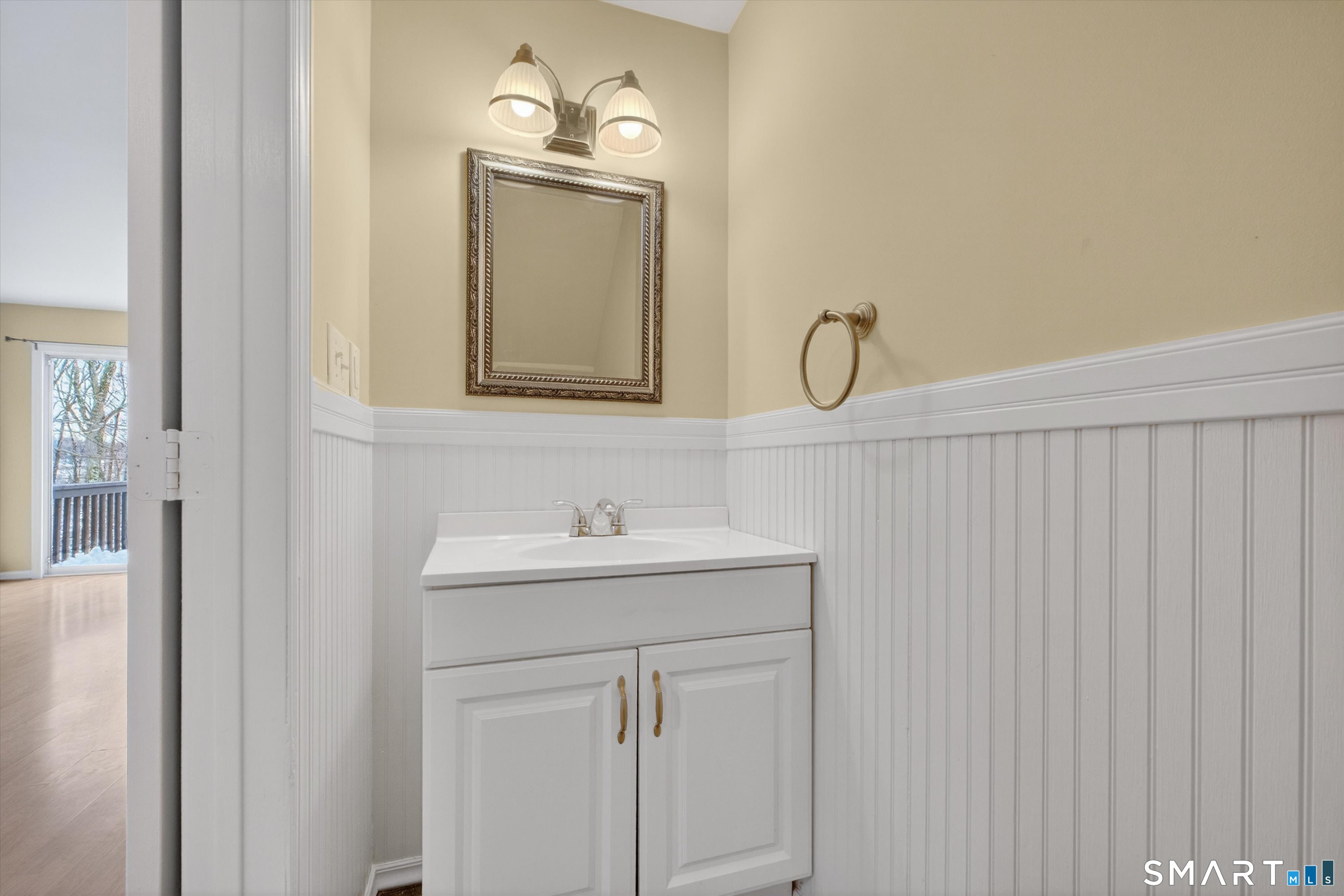 20 East Pembroke Road, Unit 8 Danbury, CT 06811 - Photo 11 of 23 a bathroom with a sink vanity and a mirror