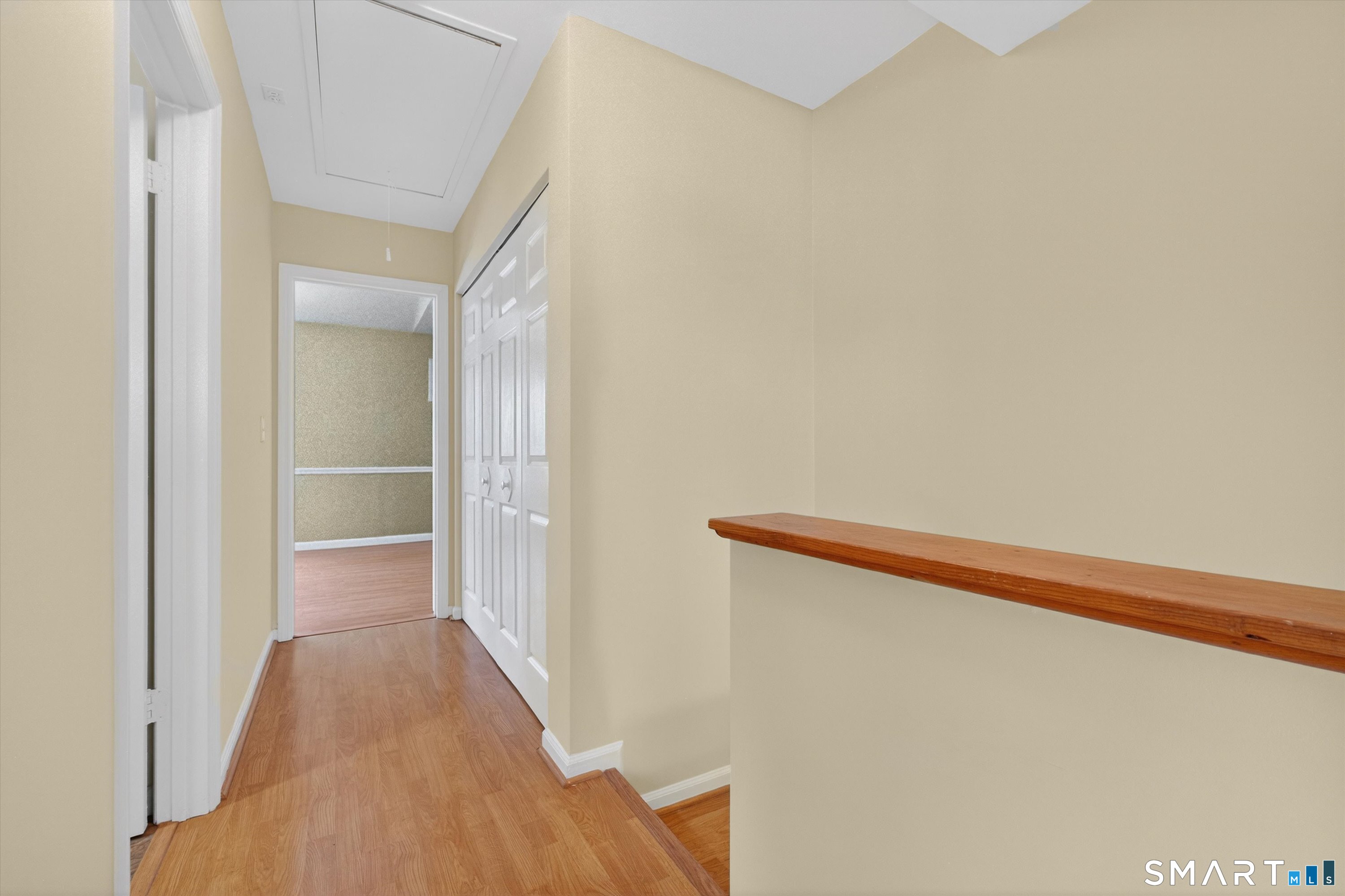 20 East Pembroke Road, Unit 8 Danbury, CT 06811 - Photo 15 of 23 a view of a hallway with wooden floor