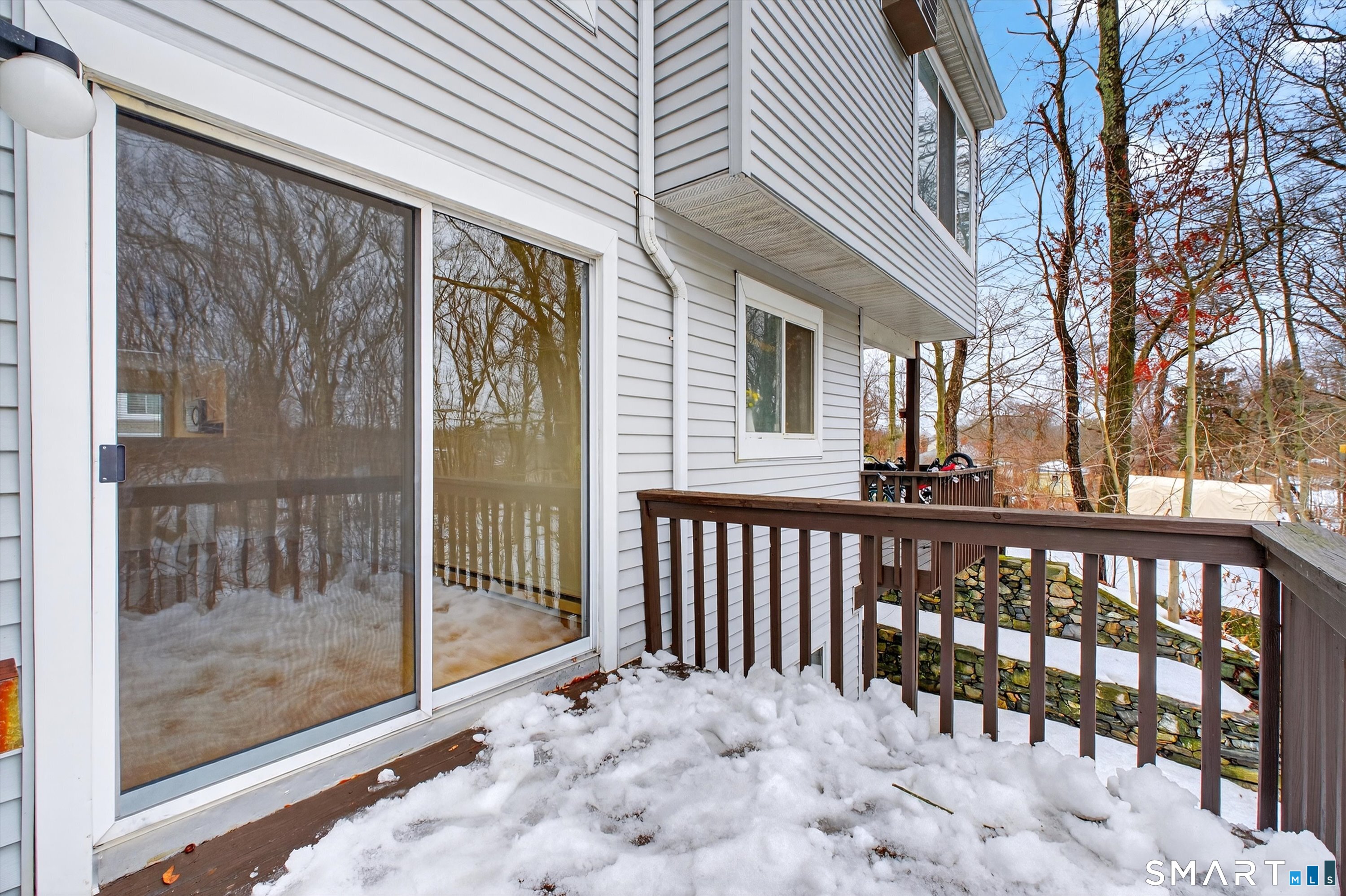 20 East Pembroke Road, Unit 8 Danbury, CT 06811 - Photo 20 of 23 a view of a brick house with a large window