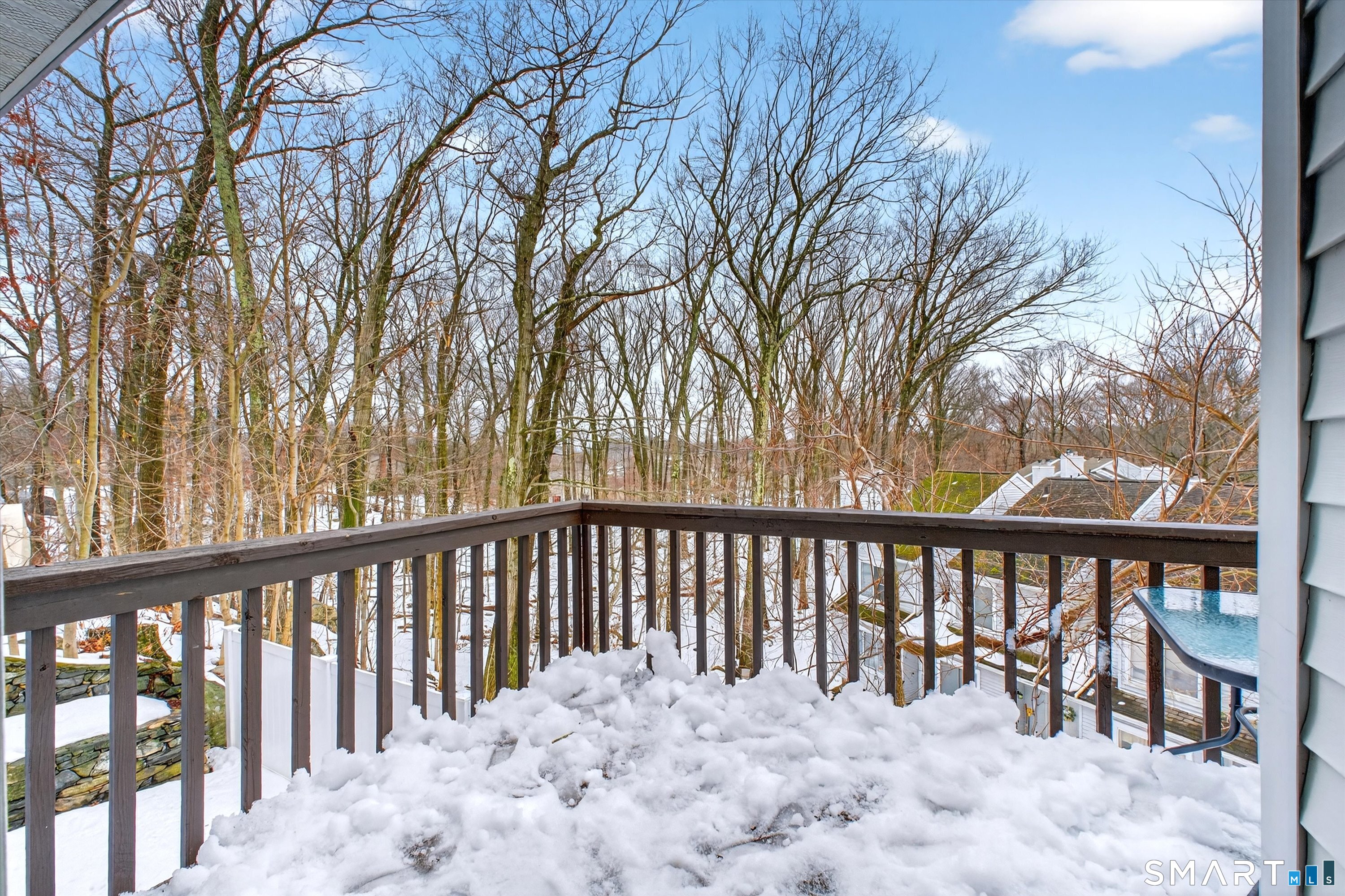 20 East Pembroke Road, Unit 8 Danbury, CT 06811 - Photo 21 of 23 a view of a two chairs and table in the balcony
