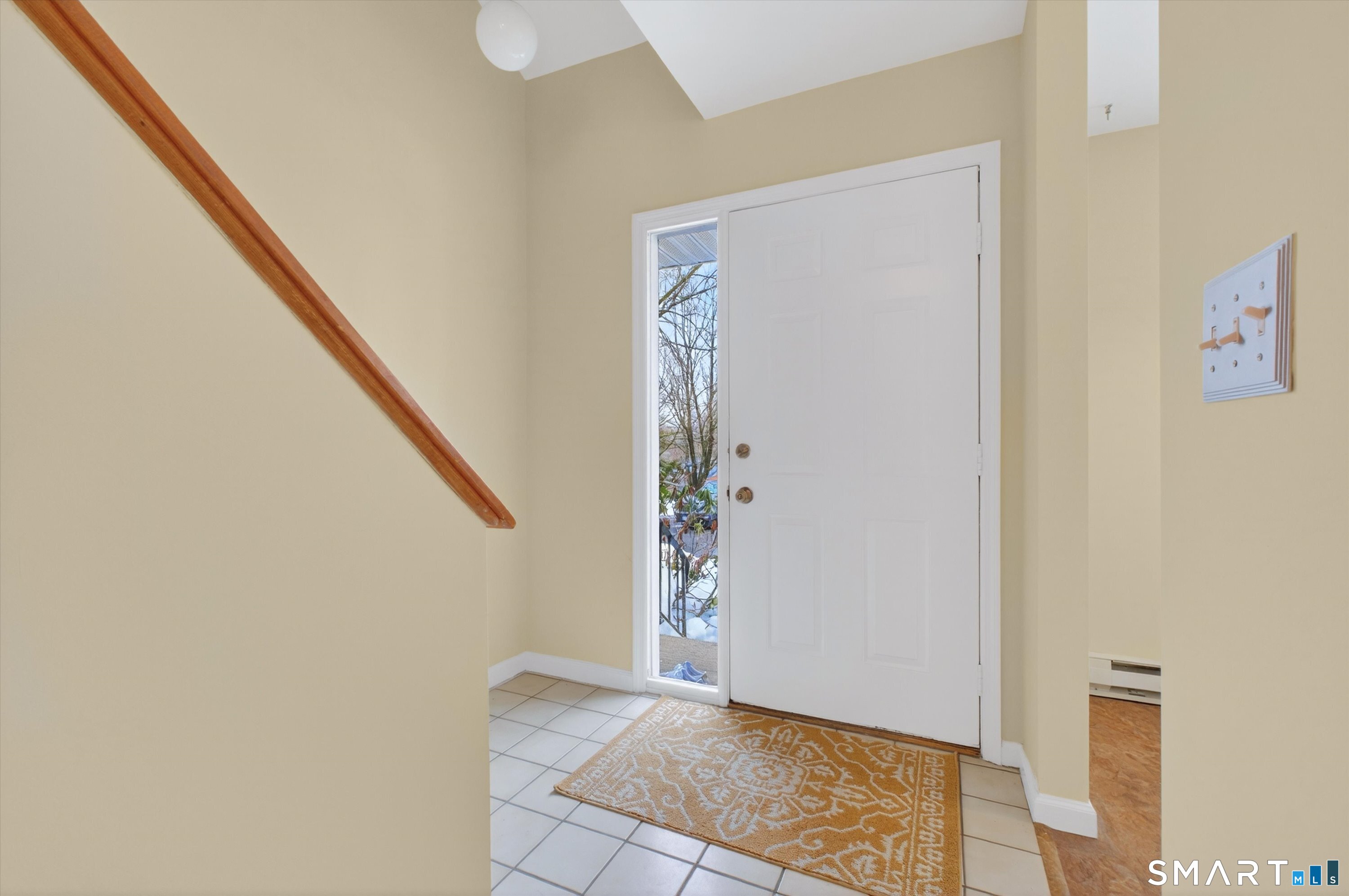 20 East Pembroke Road, Unit 8 Danbury, CT 06811 - Photo 3 of 23 a view of an entryway with staircase