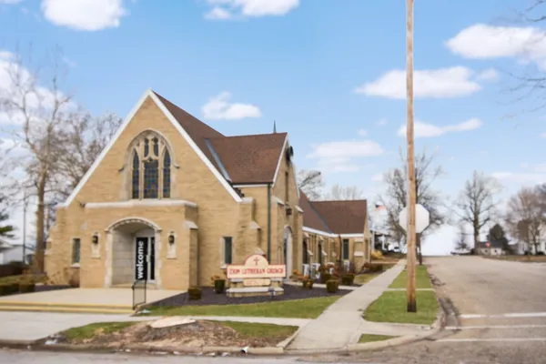 a front view of a house with a view of residential houses