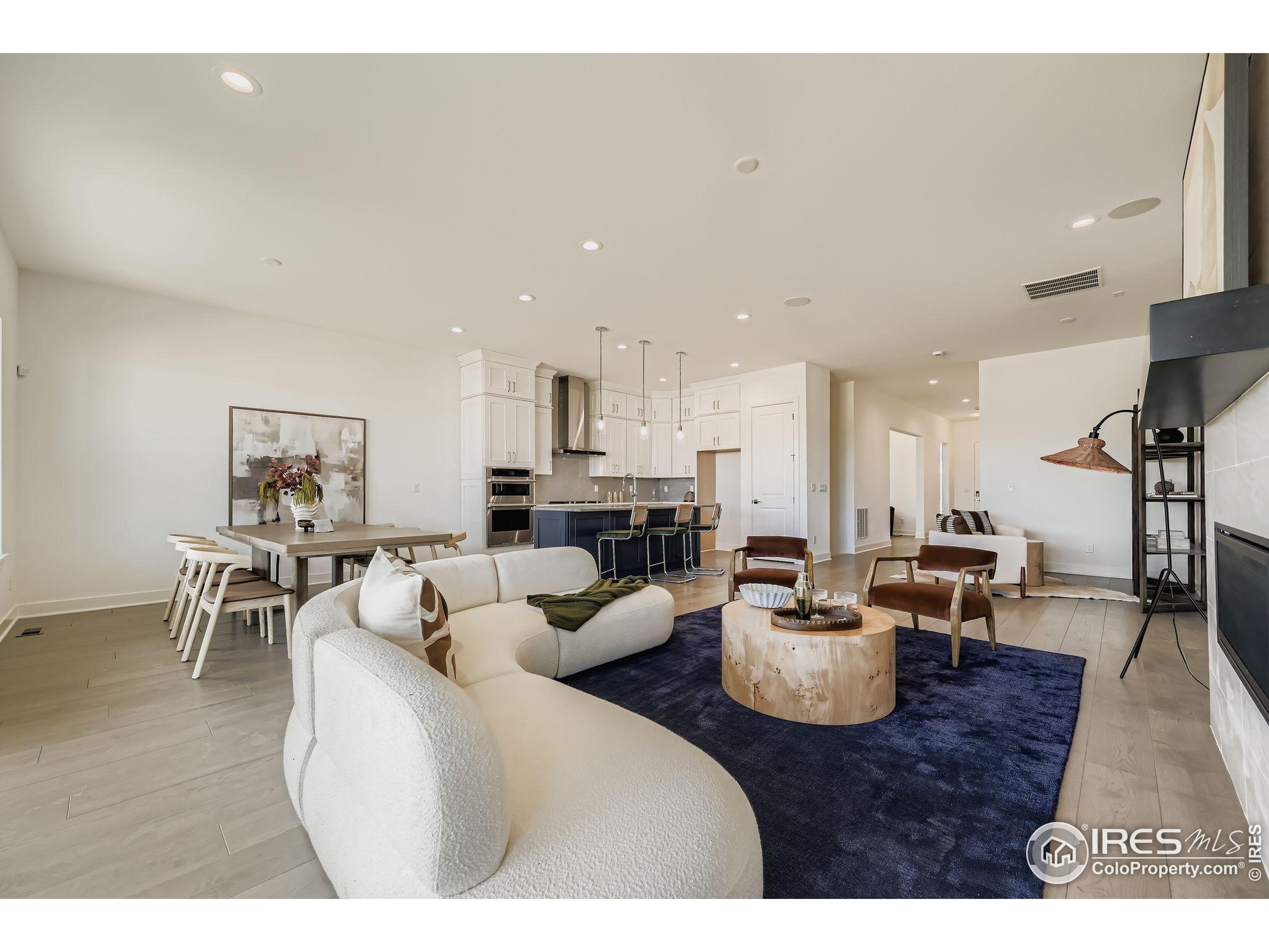 3100 Newfound Lk Road Berthoud, CO 80513 - Photo 3 of 21 a living room with furniture and a wooden floor
