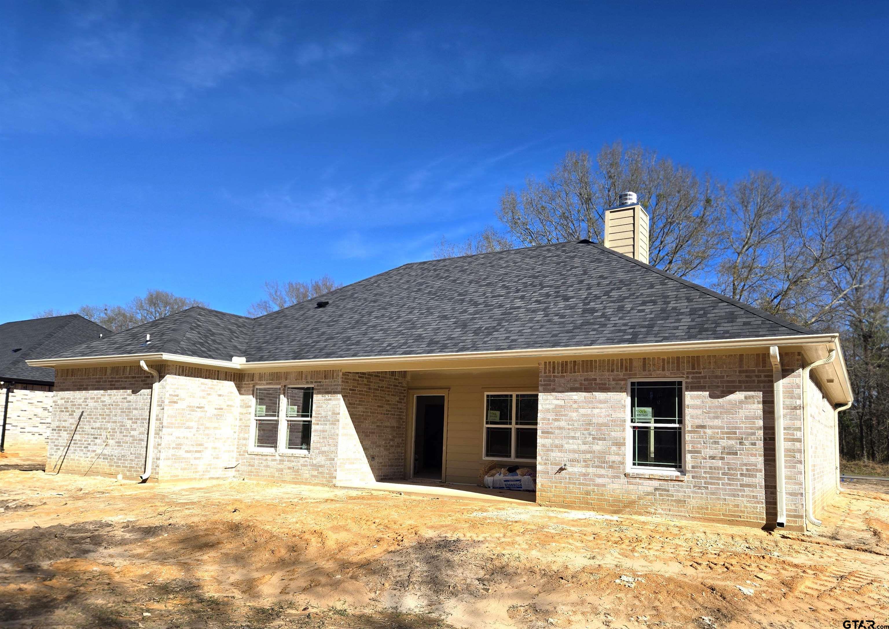 7227 Cr 485 Tyler Tx 75706 Tyler, TX 75706 - Photo 23 of 23 a house with trees in the background